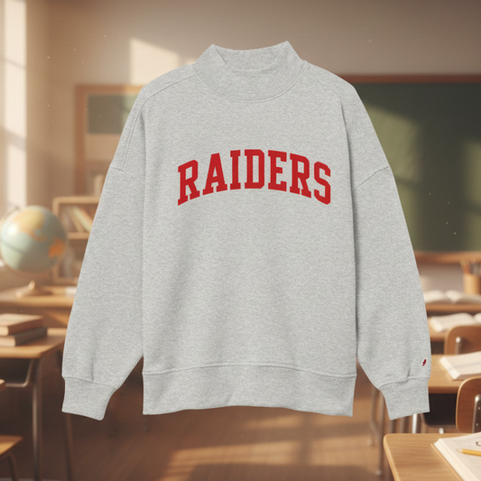 A light heather gray crewneck sweatshirt with 'RAIDERS' printed in red arched block letters across the chest, displayed on a clean white background.